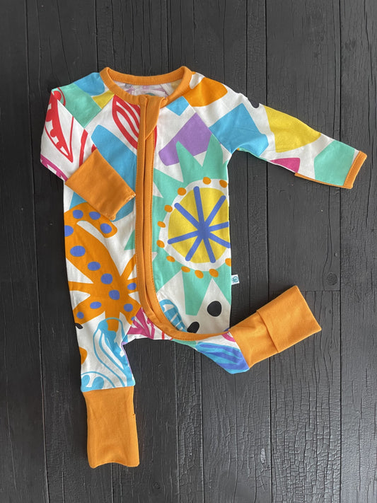 multi coloured long sleeve baby onesie with fold over hand and foot cuffs in unisex design